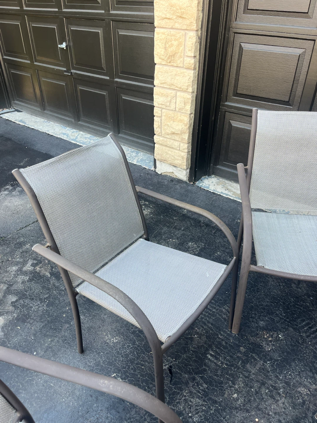 Outdoor patio dining set with glass table and chairs