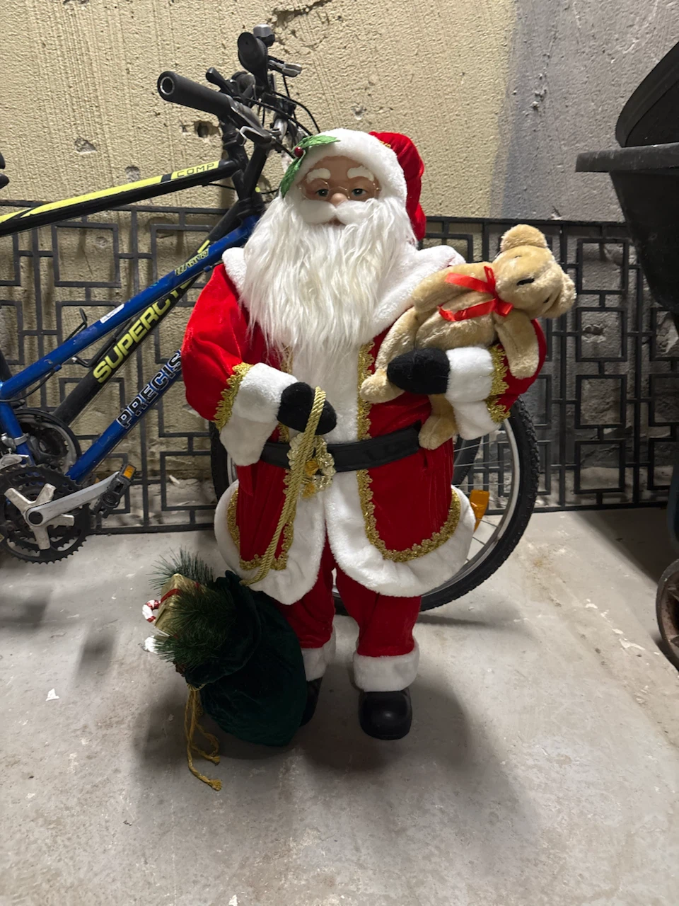 Decorative Santa Claus Figure with Teddy Bear