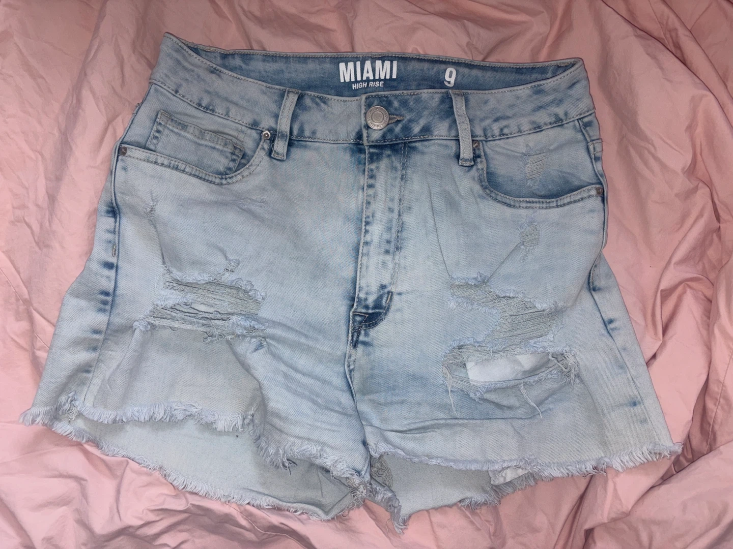 Ripped Blue Jean Shorts