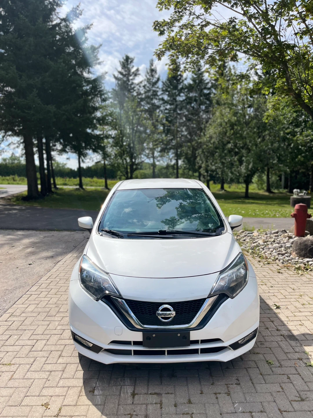 2017 White Nissan Versa SV Hatchback