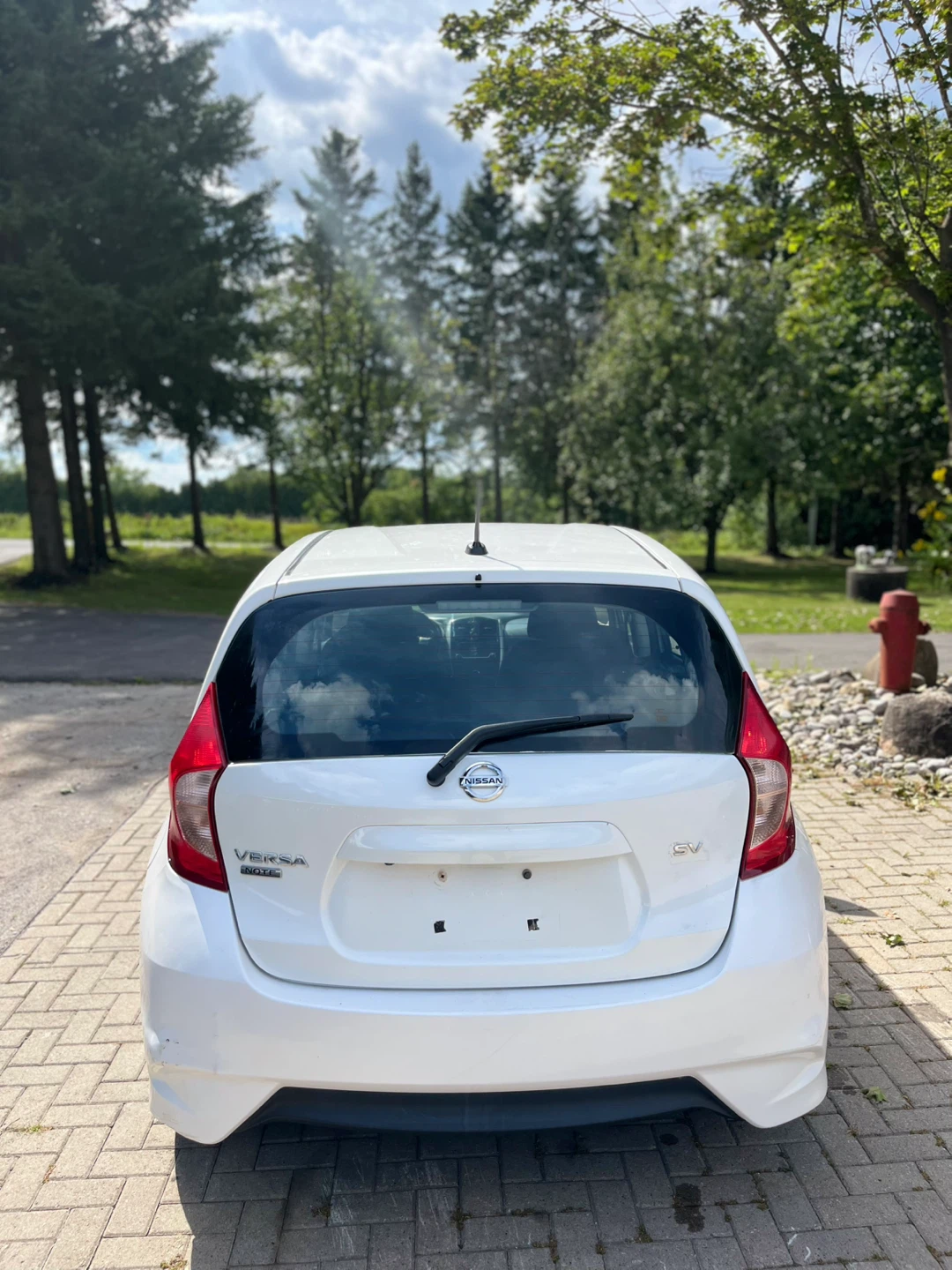 2017 White Nissan Versa SV Hatchback - photo 5