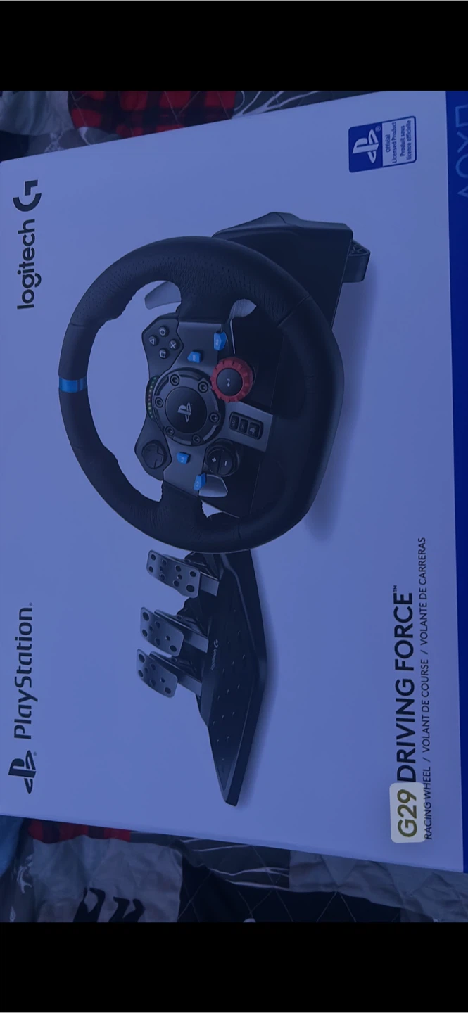 Logitech G29 Racing Wheel + Pedals and Gear Shifter.