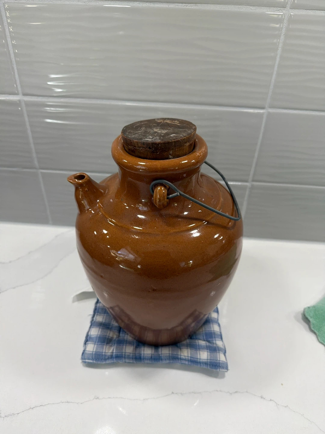 Brown Ceramic Jug with Spout and Wooden Stopper
