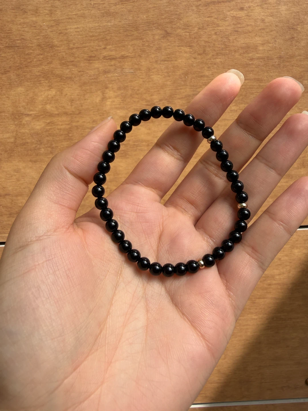 Black Beaded Bracelet with Gold Accents