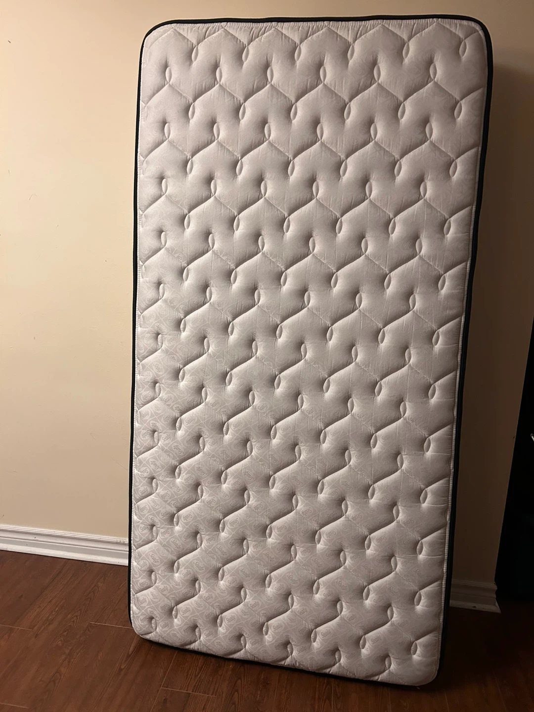 Twin size mattress . White, clean , non smoking home .