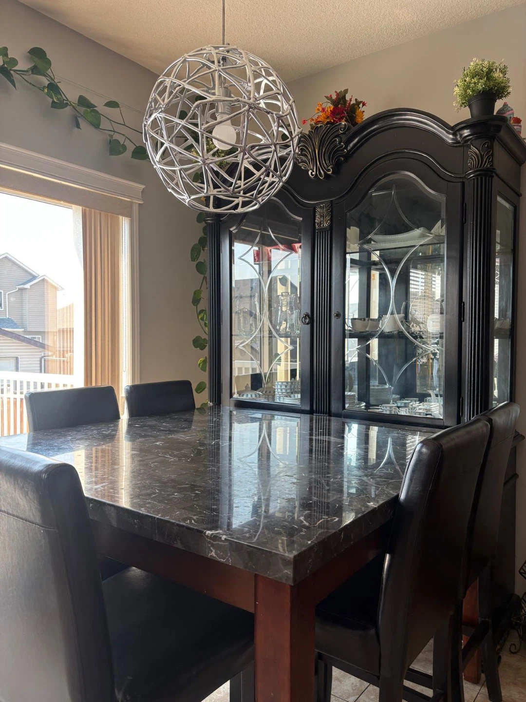 Black China Cabinet and dining table with 6 chairs