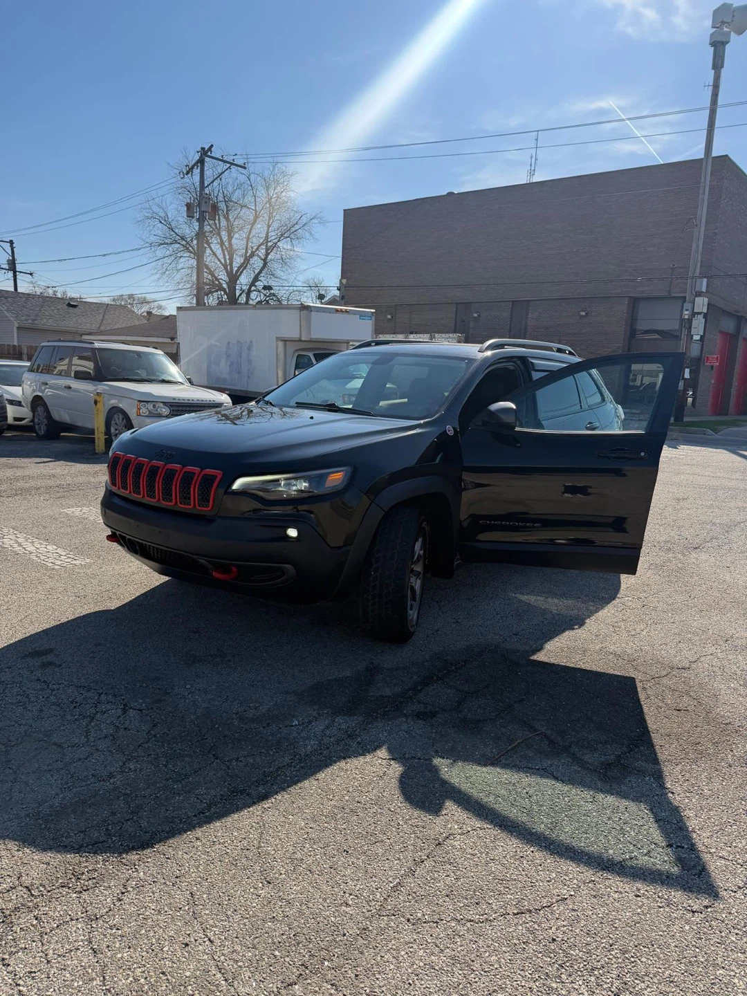 Black Jeep Cherokee SUV