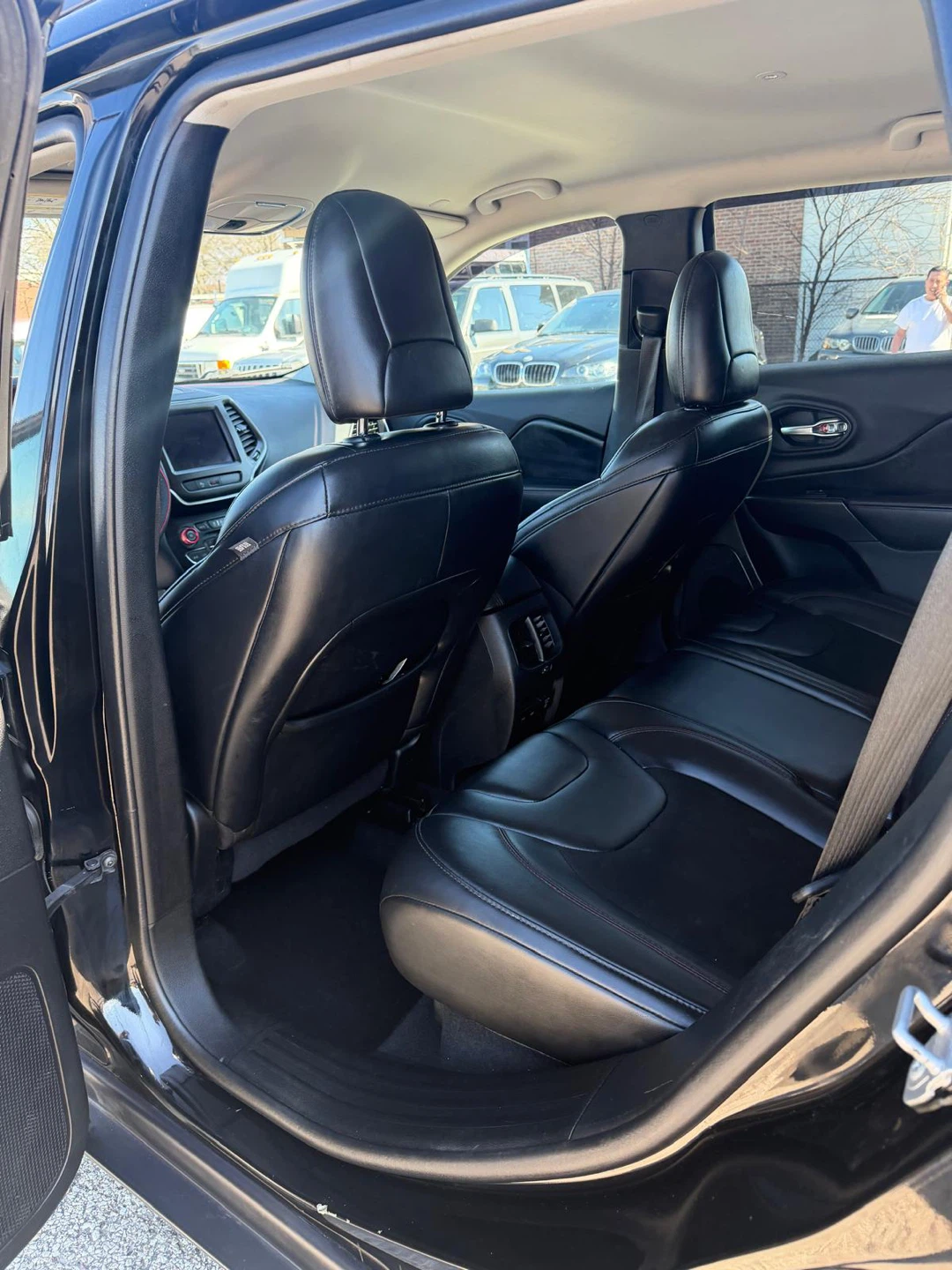 Black Jeep Cherokee SUV - photo 3