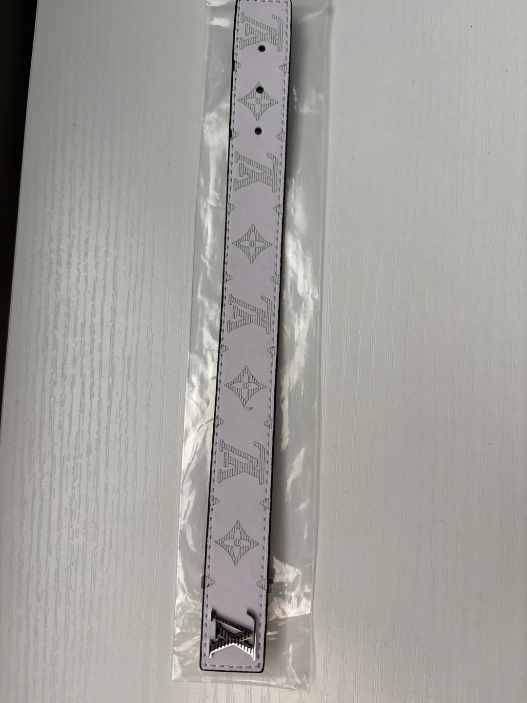LV band (white and green accents)