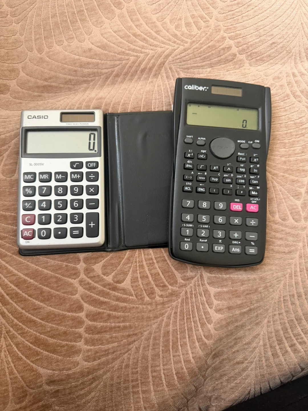 Casio SL-300SV Calculator and Caliber Scientific Calculator