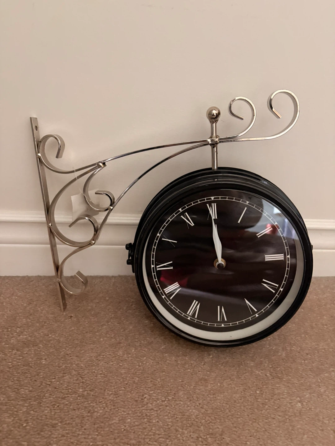 Black Double-Sided Station Clock with Ornate Bracket