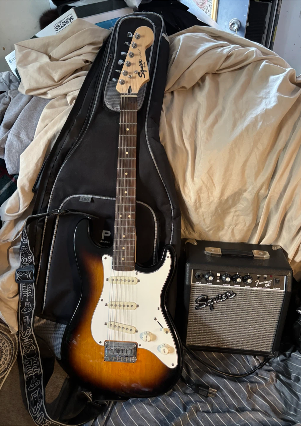 Squier Stratocaster Electric Guitar with Profile Amp and Gig Bag