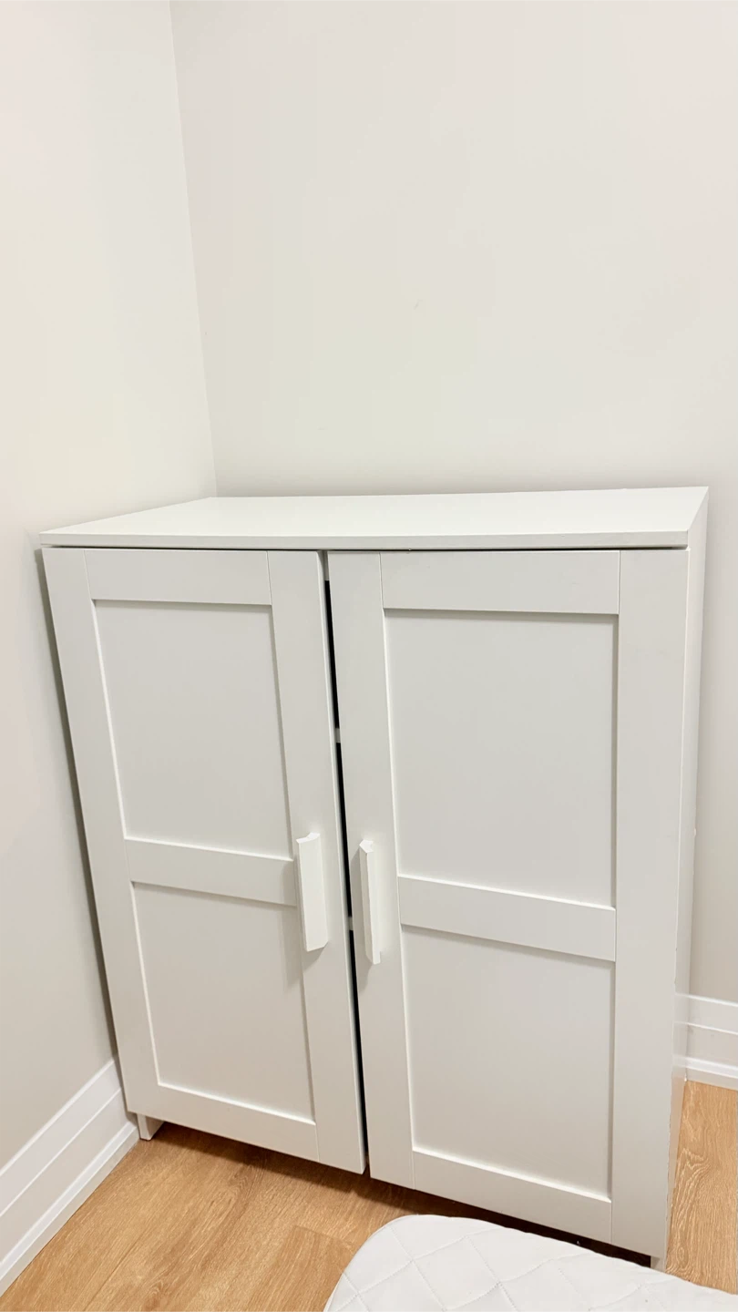 White Two-Door Cabinet with Shelves