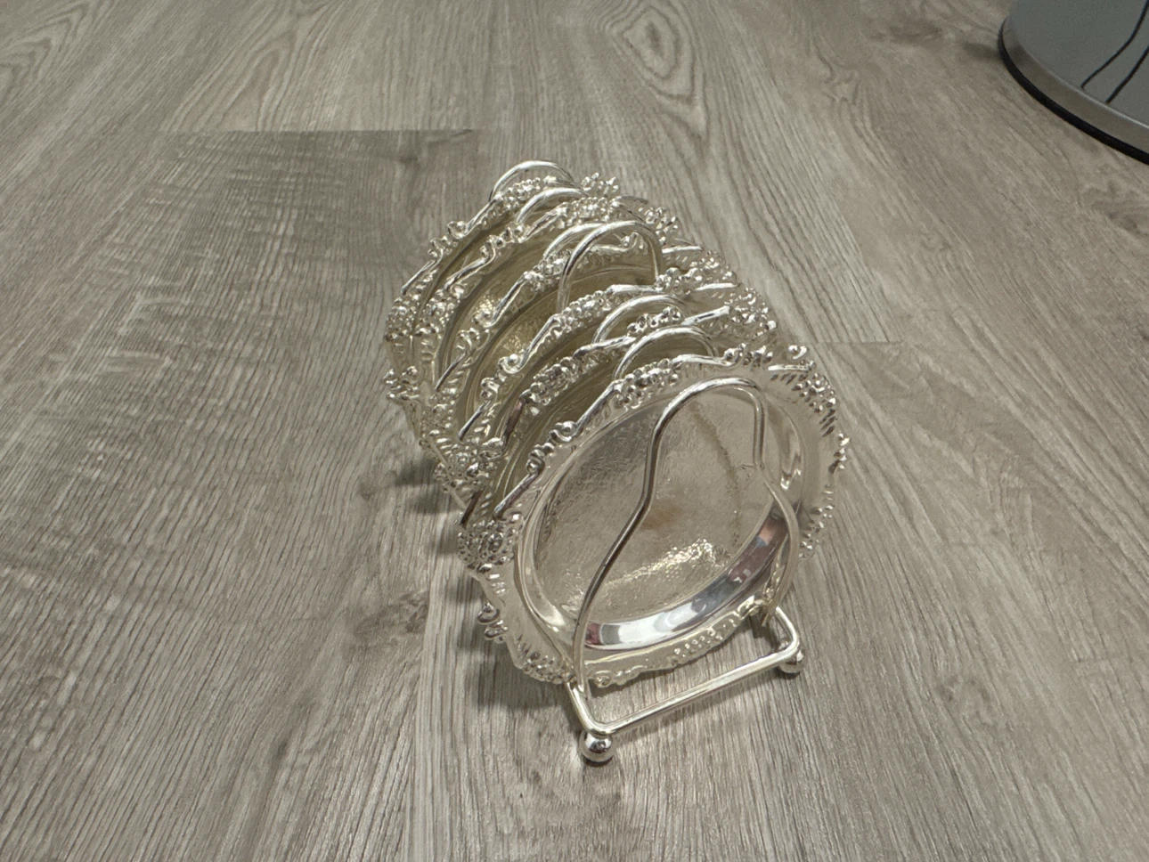Ornate Silver-Tone Coaster Set with Holder