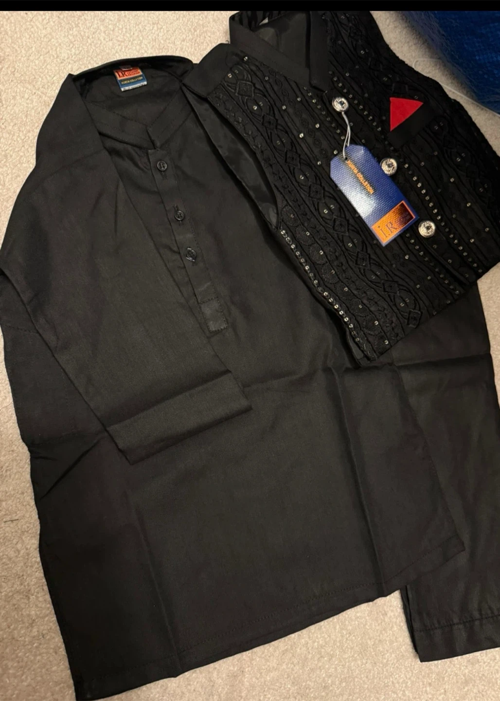 Black kurta set with embroidered vest