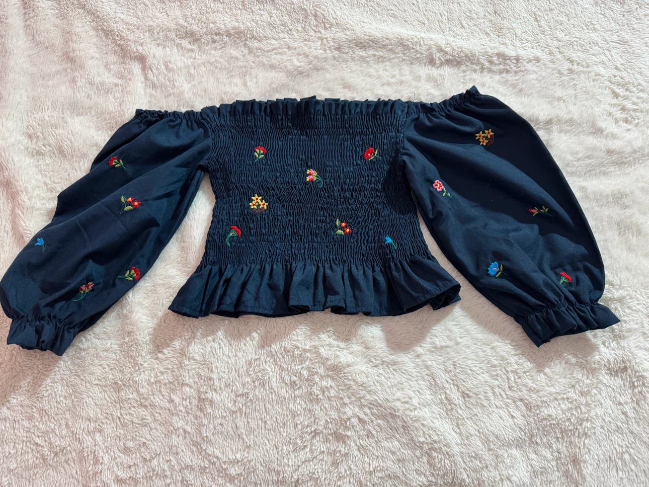 Navy Blue Smocked Off-Shoulder Top with Floral Embroidery