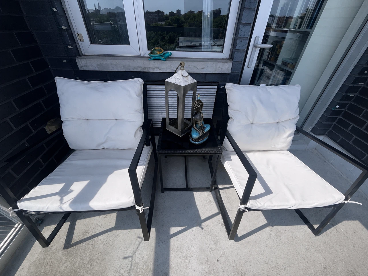 Set of 2 Black Metal Frame Outdoor Chairs with White Cushions