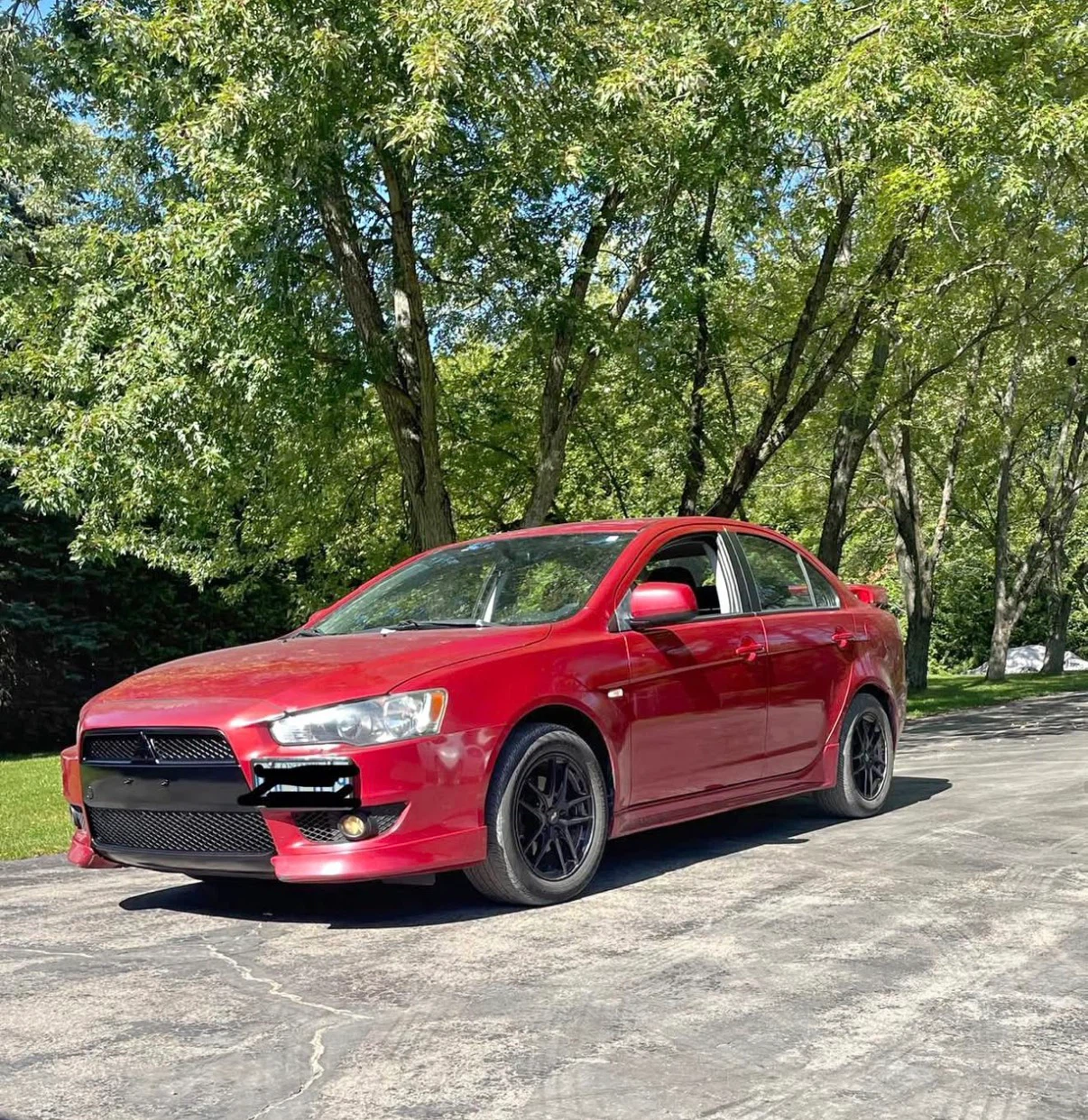 2009 Red Mitsubishi Lancer