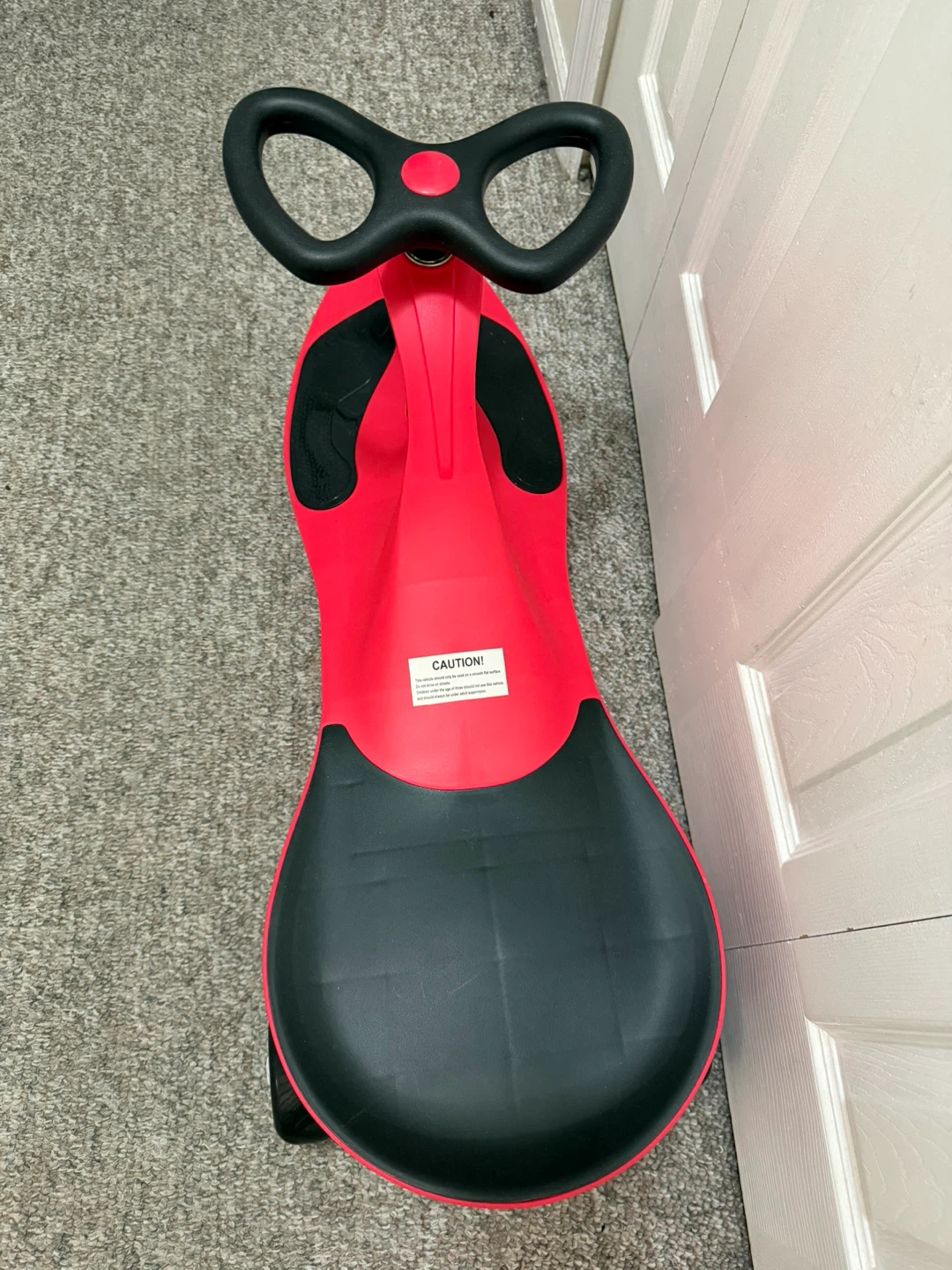 Red Ride-On Swivel Toy Car