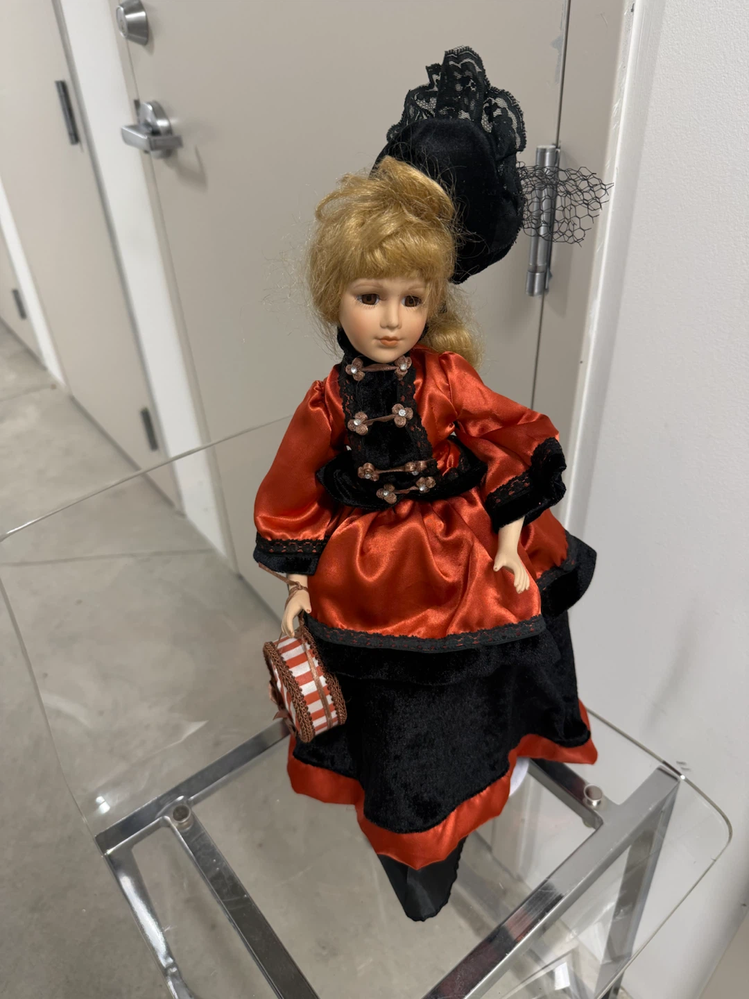 Porcelain Doll with Red and Black Dress