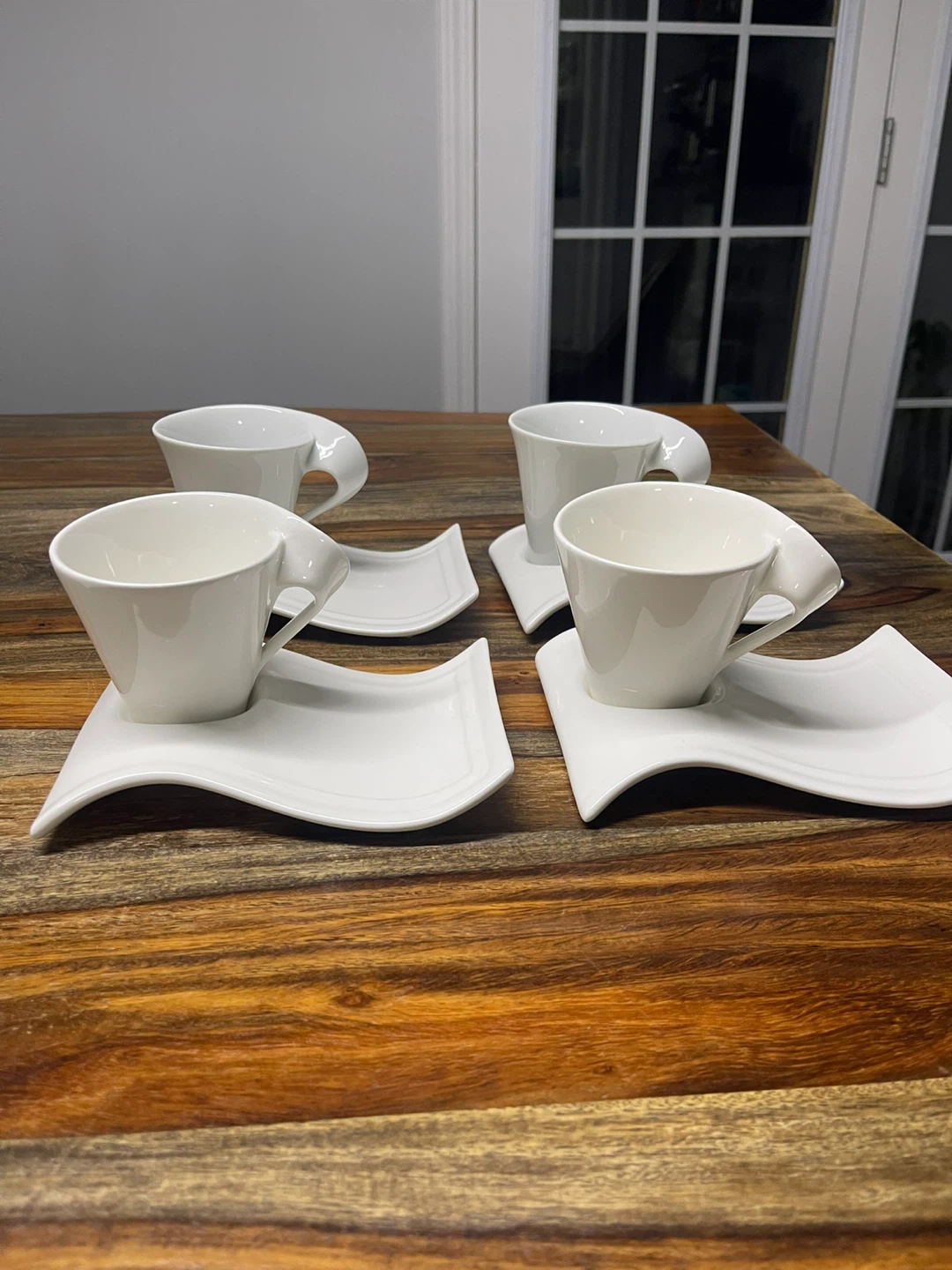 Set of 4 White Ceramic Cups and Saucers