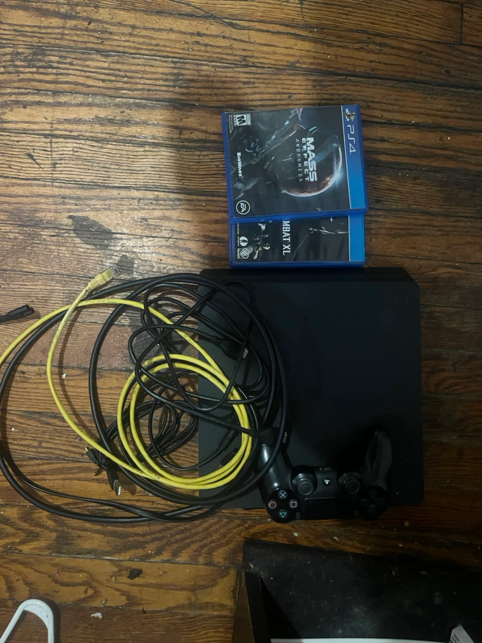 PS4 slim with controller 2 games and all wires