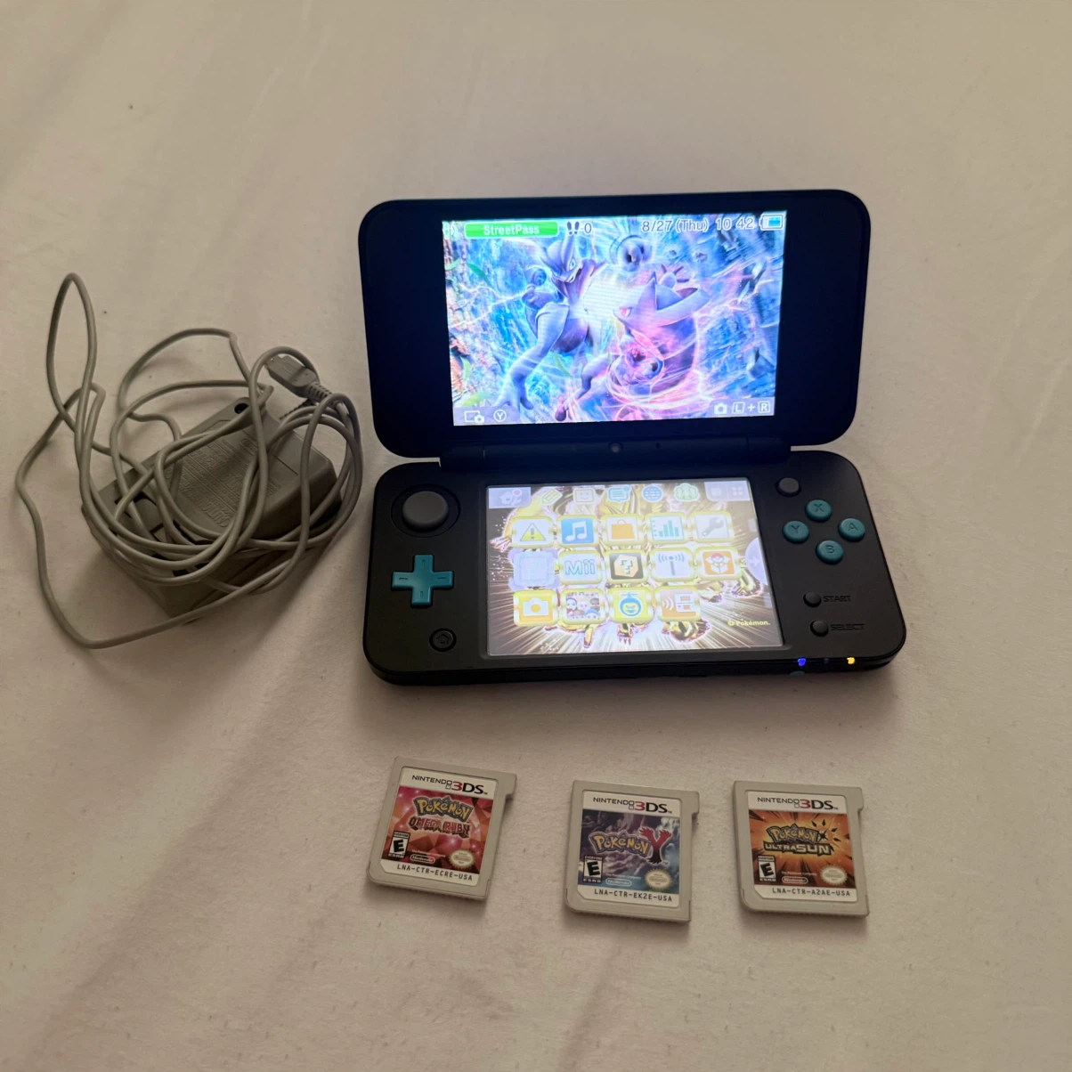 Selling Nintendo 2DS XL with games for $380