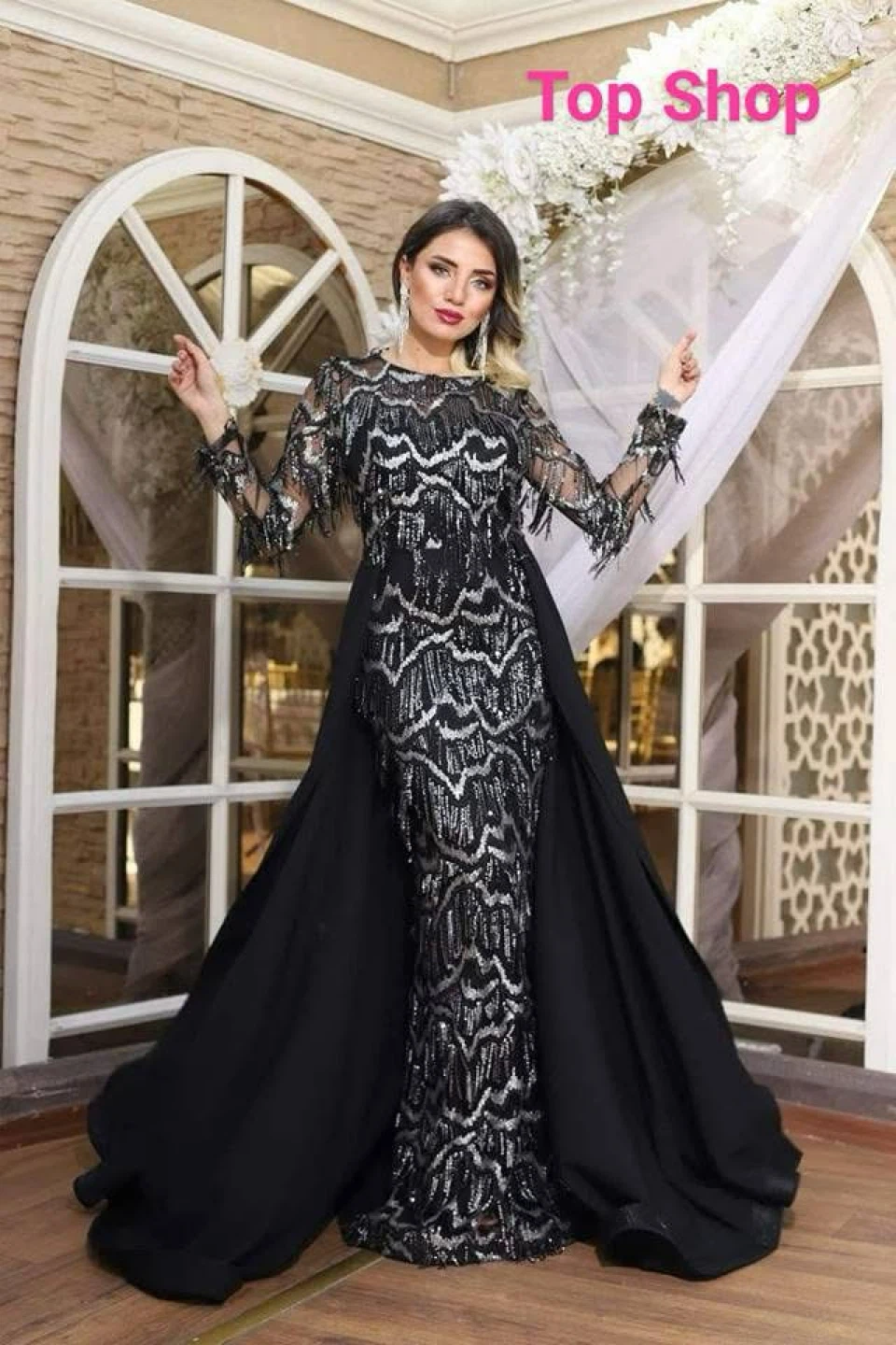Black sequined evening gown with cape detail