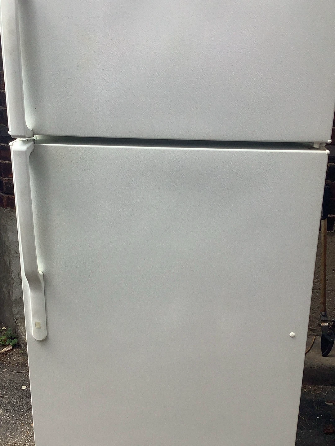 Free GE used fridge for man cave garage basement