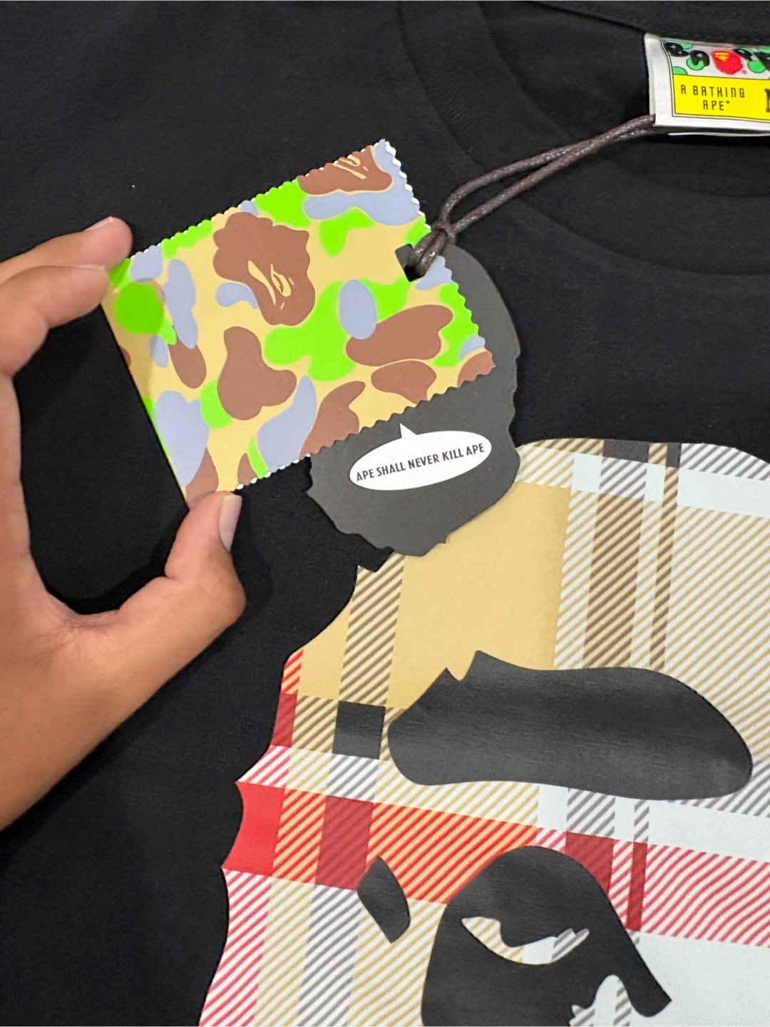 A 100% cotton T-Shirt featuring a Bape logo. - photo 3