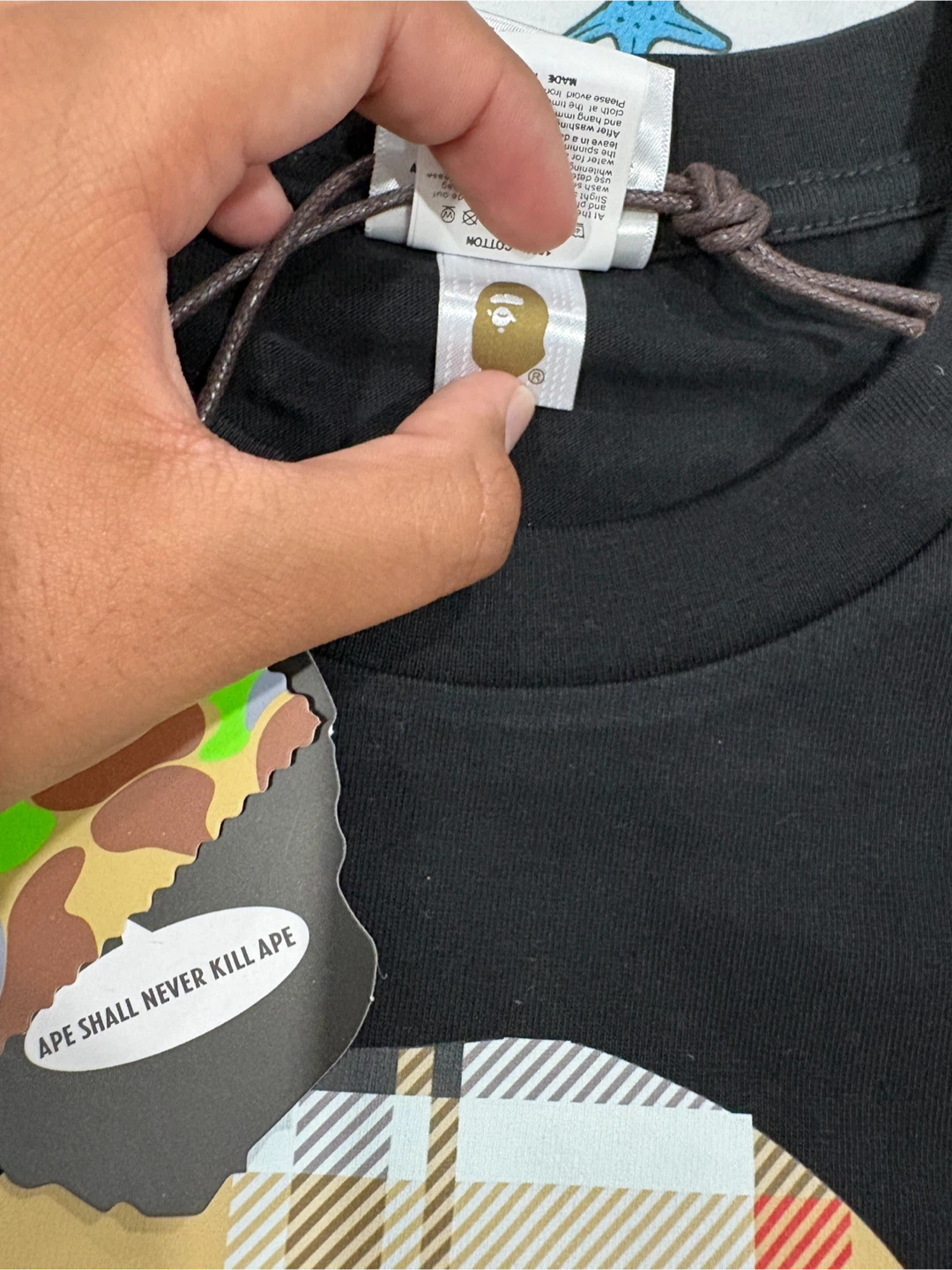 A 100% cotton T-Shirt featuring a Bape logo. - photo 5
