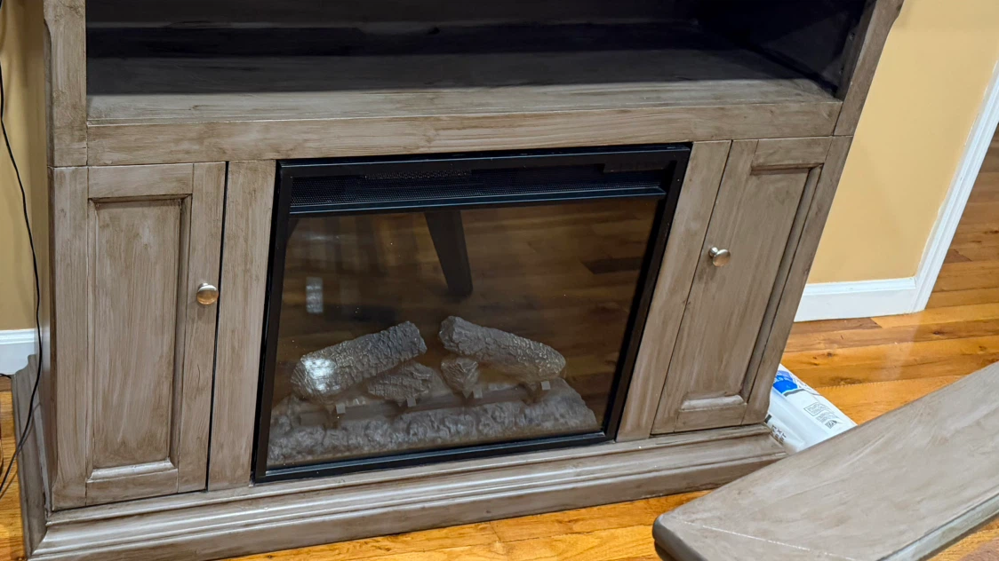 Wood Entertainment Center with Electric Fireplace