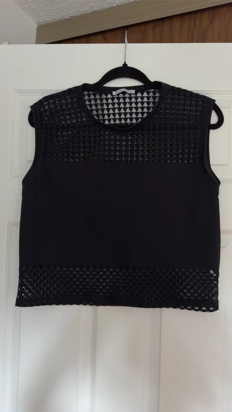 Black Sleeveless Top with Cut-out Detail