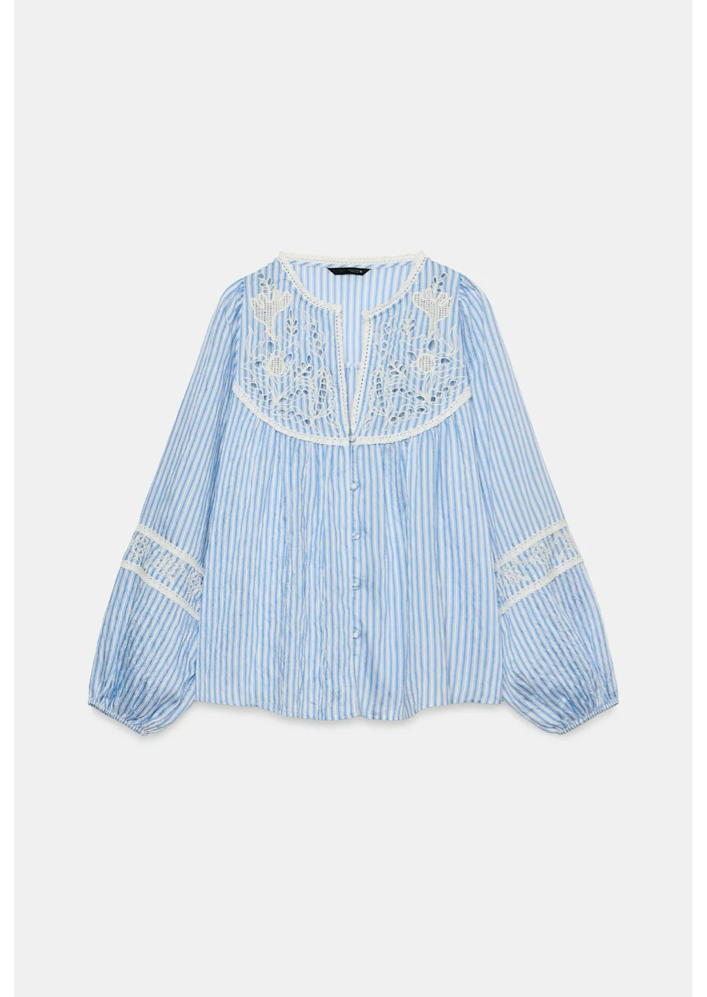 Blue and white striped blouse with white lace details
