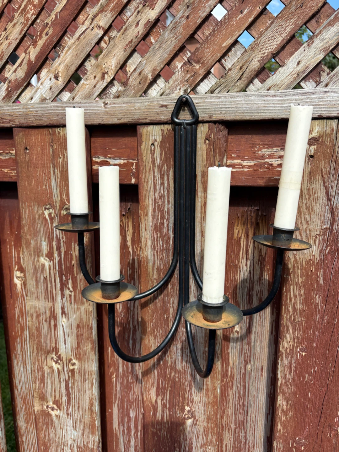 Black metal 4-arm candelabra wall sconce