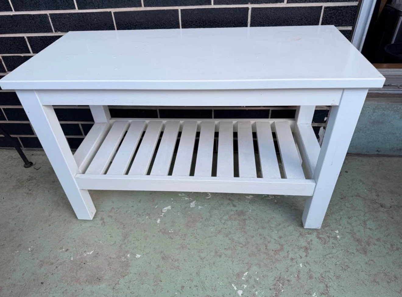 White coffee table with shelf