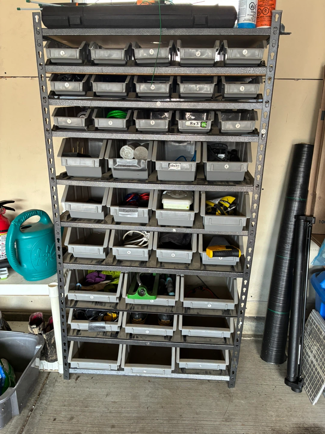 Grey Storage Bins with Metal Shelving Unit