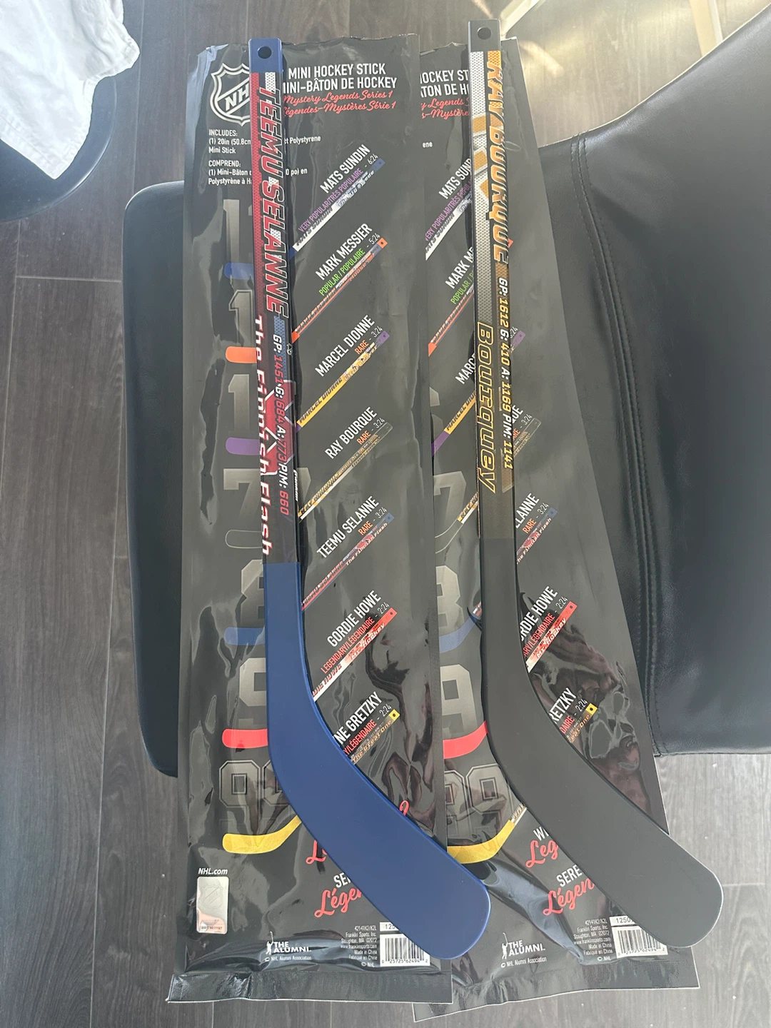 2 NHL Alumni Mini Hockey Sticks (Teemu Selanne, Ray Bourque)