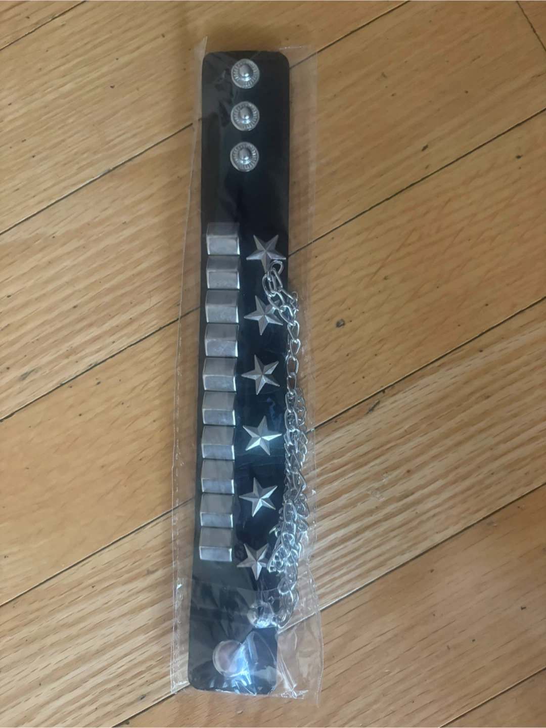 Black studded star bracelet with chain