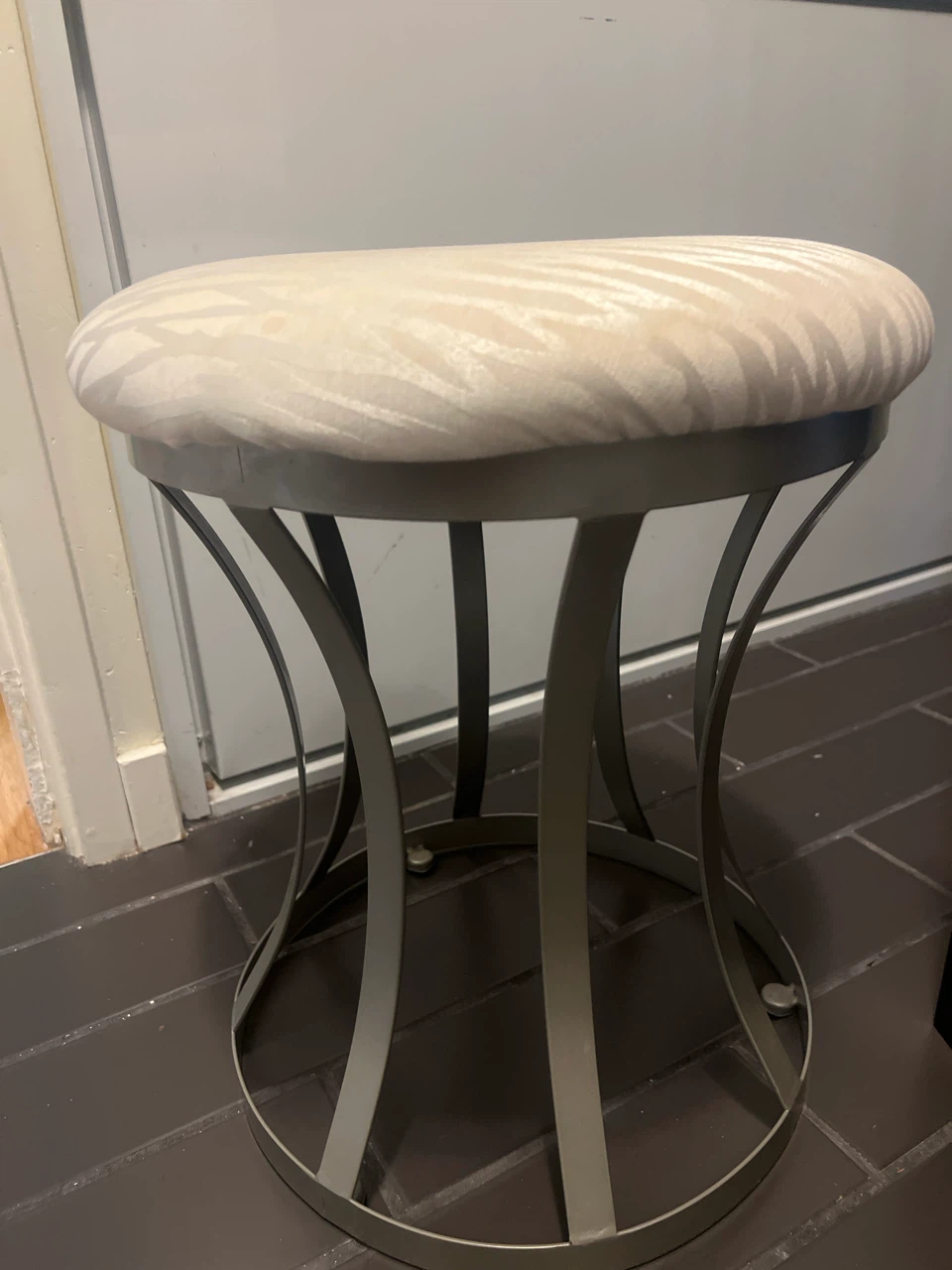 Upholstered Stool with Decorative Pattern