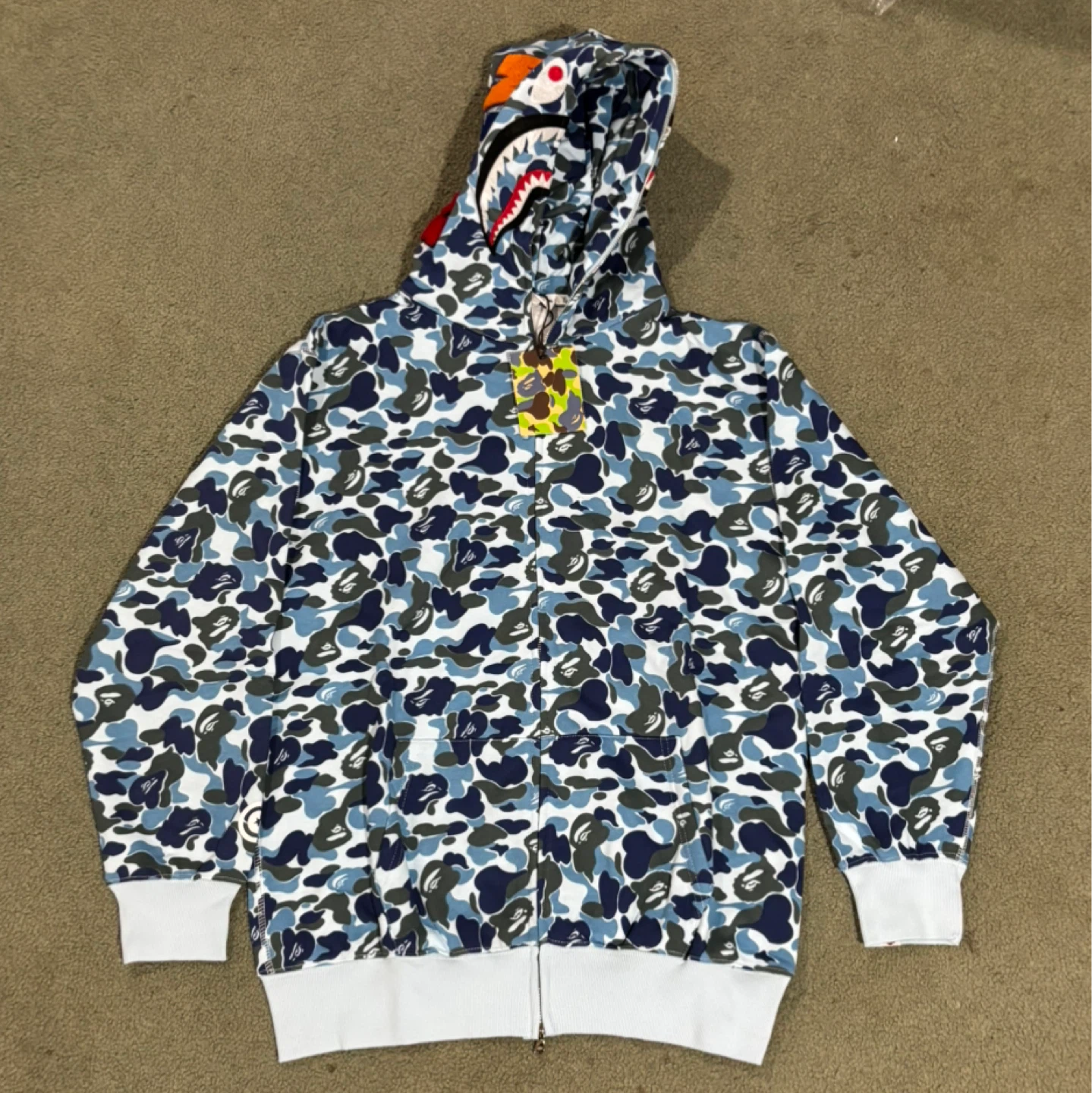 Bape hoodie light blue (fits XL)