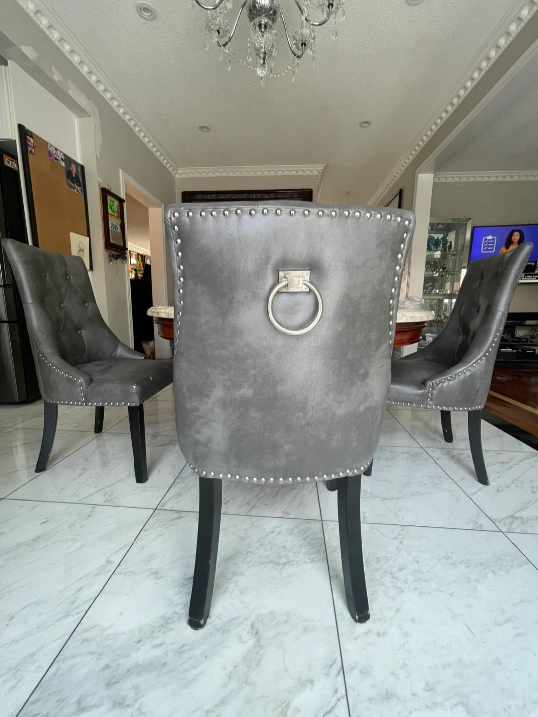 Grey Tufted Dining Chair with Silver Ring Accent