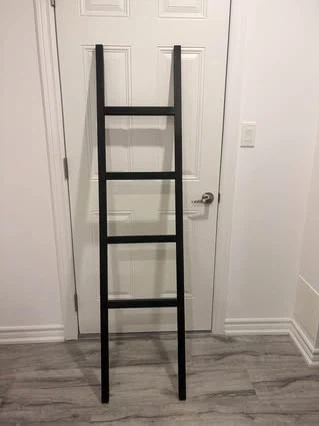Black decorative ladder