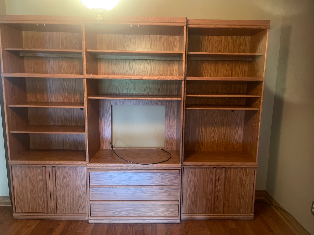 Wooden Entertainment Unit with Shelves and Drawers