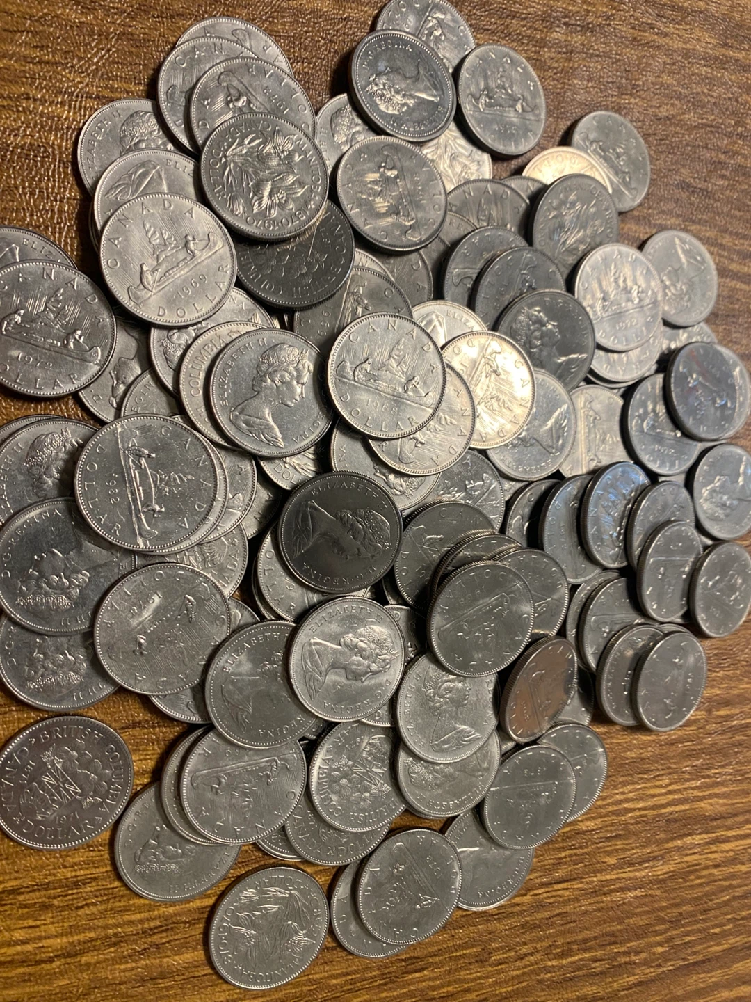 100 Assorted Canadian 1 Dollar Coins