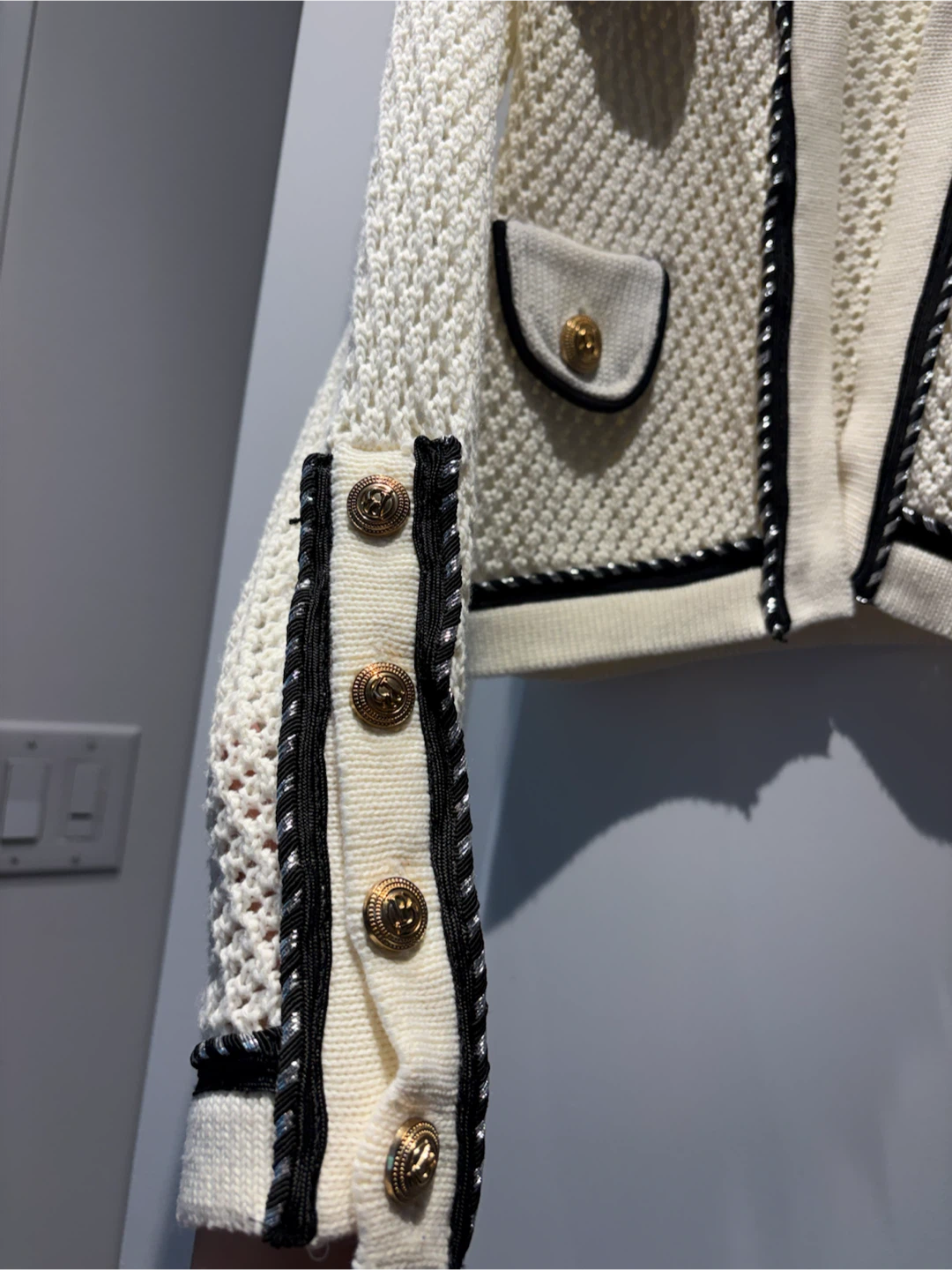 Cream knit cardigan with black trim and gold buttons - photo 3