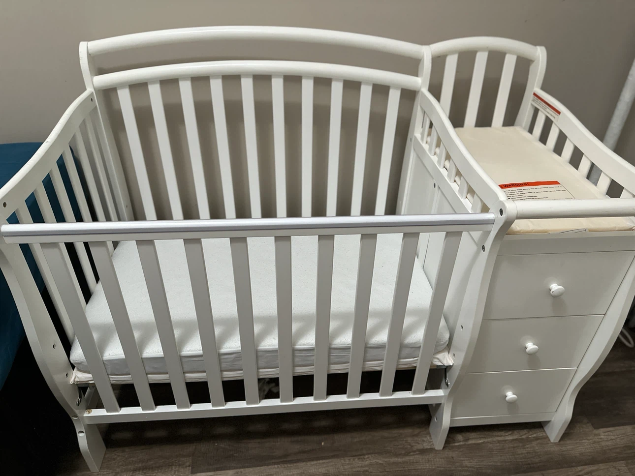 White Convertible Mini Crib with Changing Station