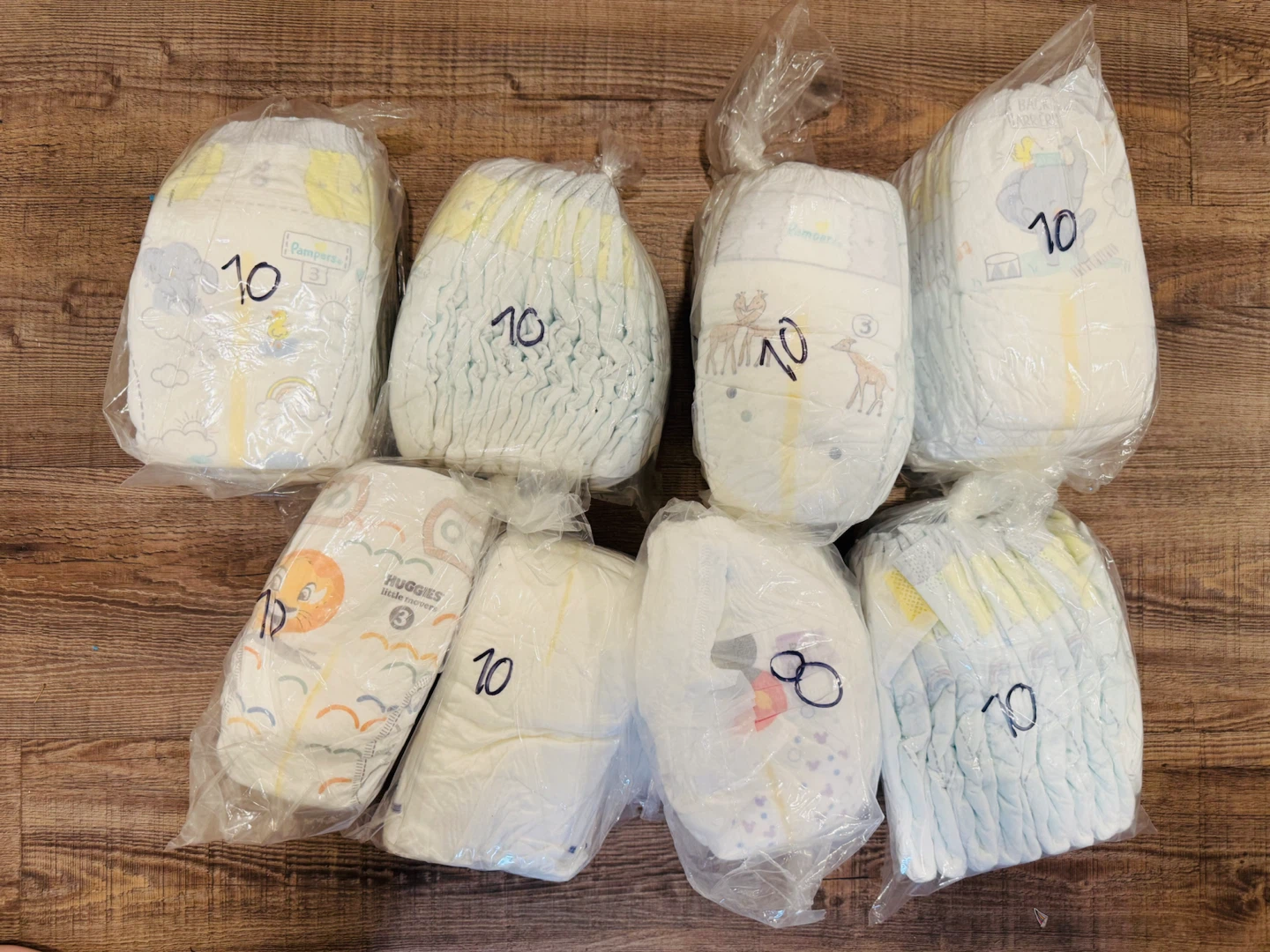 78 Pampers & Huggies Diapers Bundle