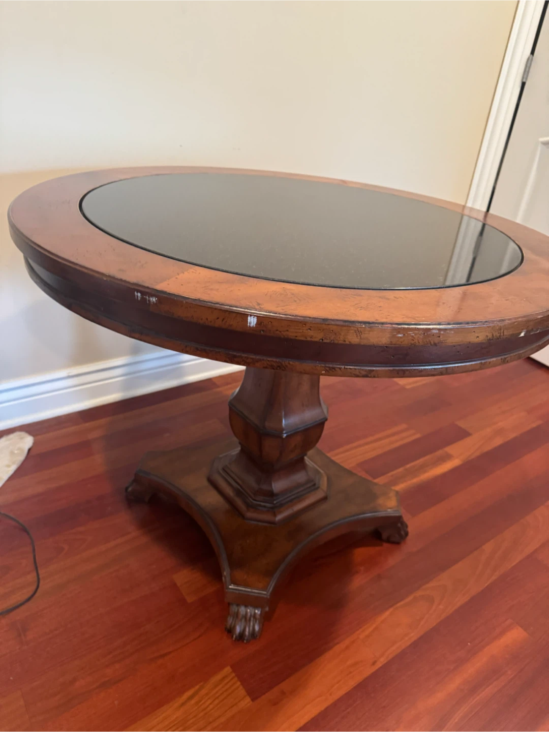 Round Pedestal Coffee Table with Black Granite Top