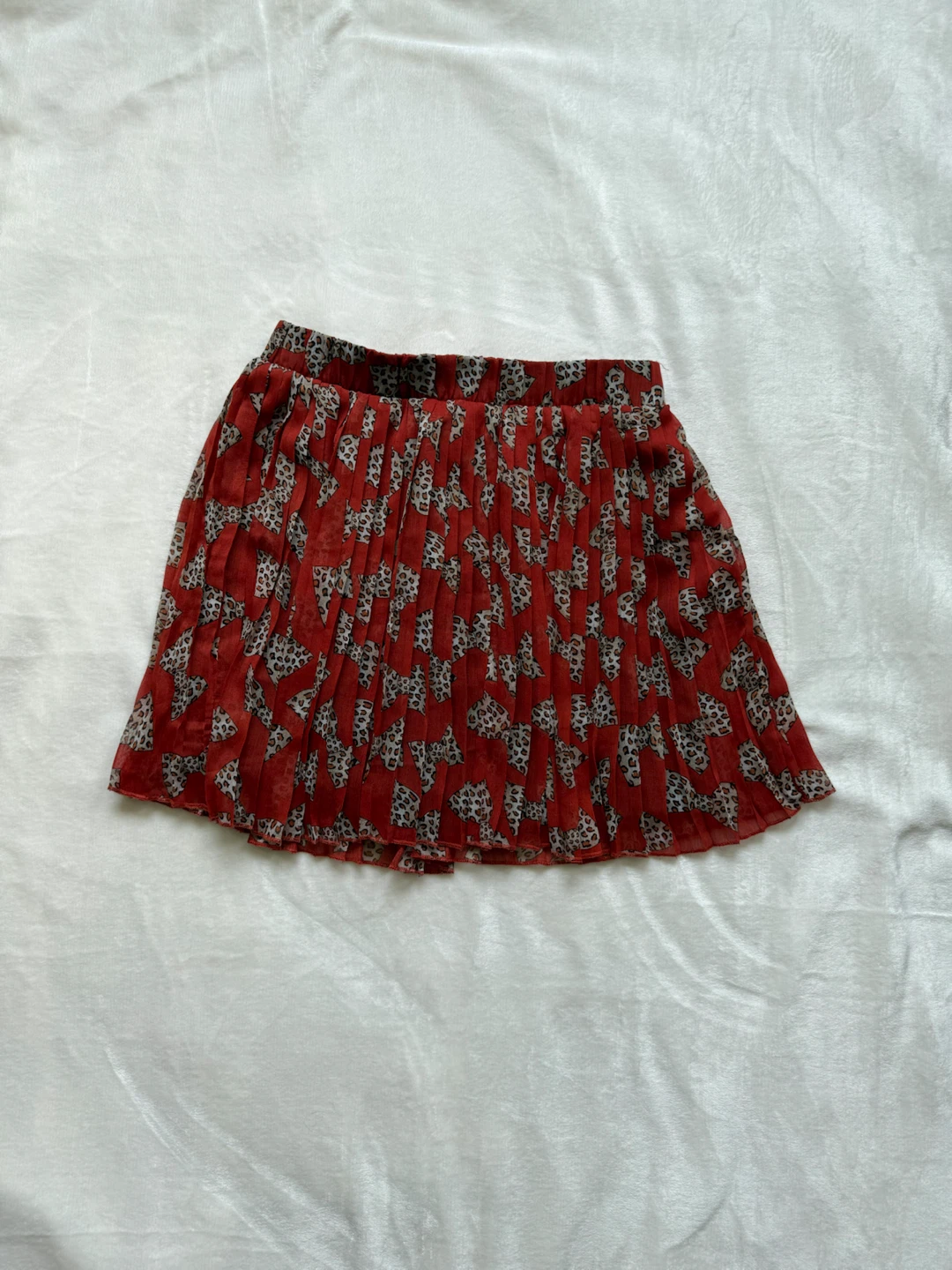 Pleated Red Skirt with Leopard Print